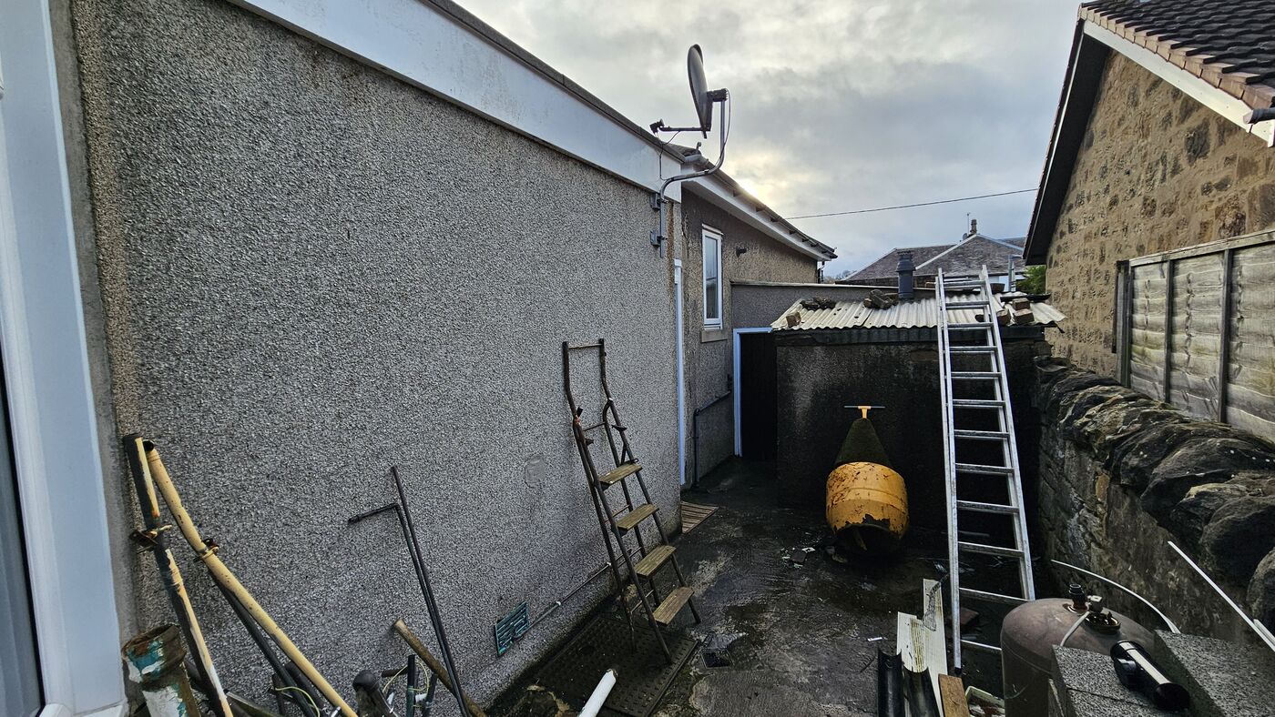 Rear gable — damp render