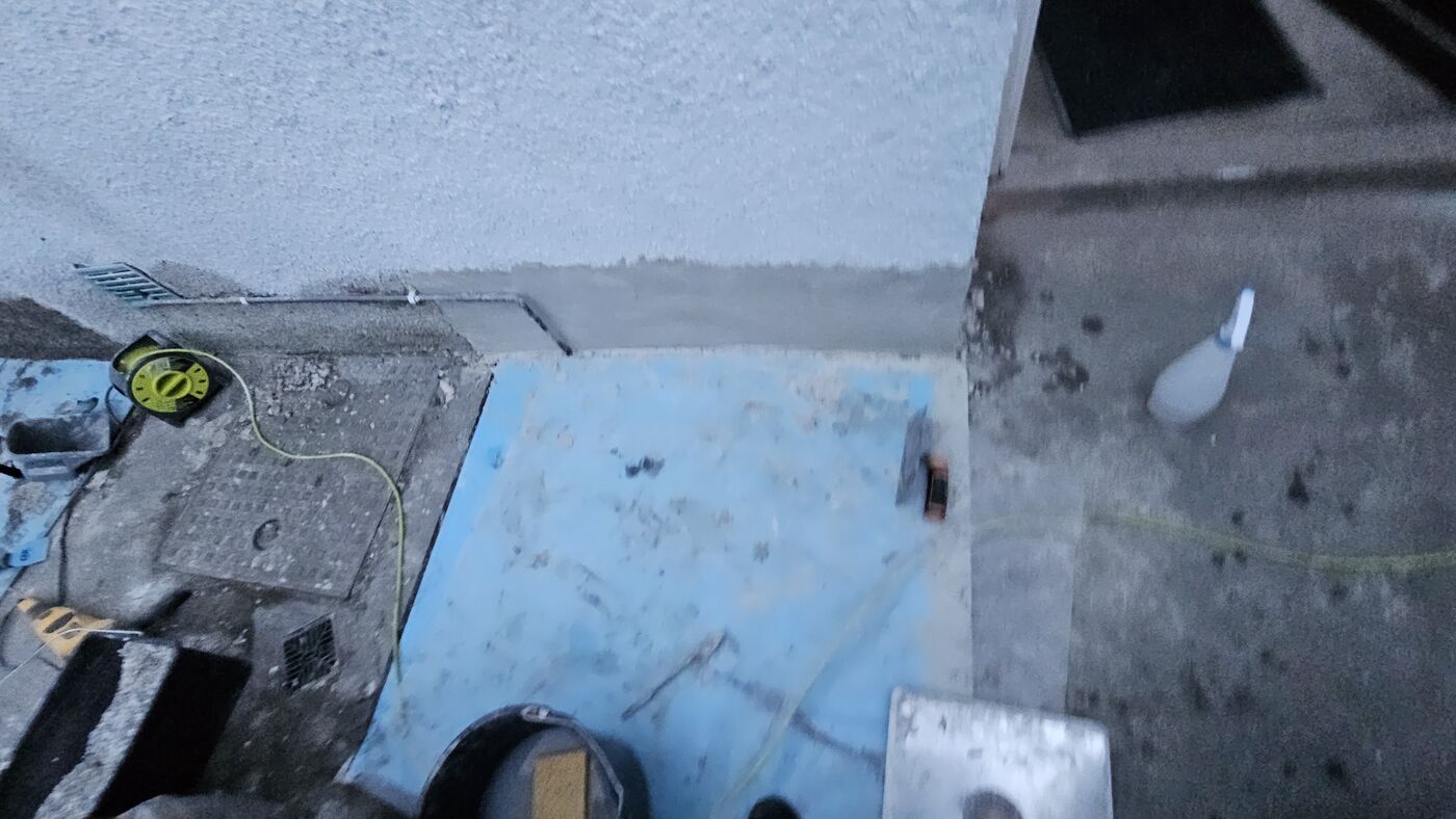 Smooth base render applied — level coat over repaired section