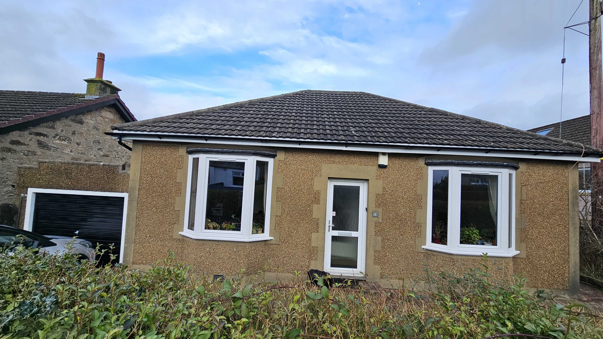 Original roof & roughcast walls